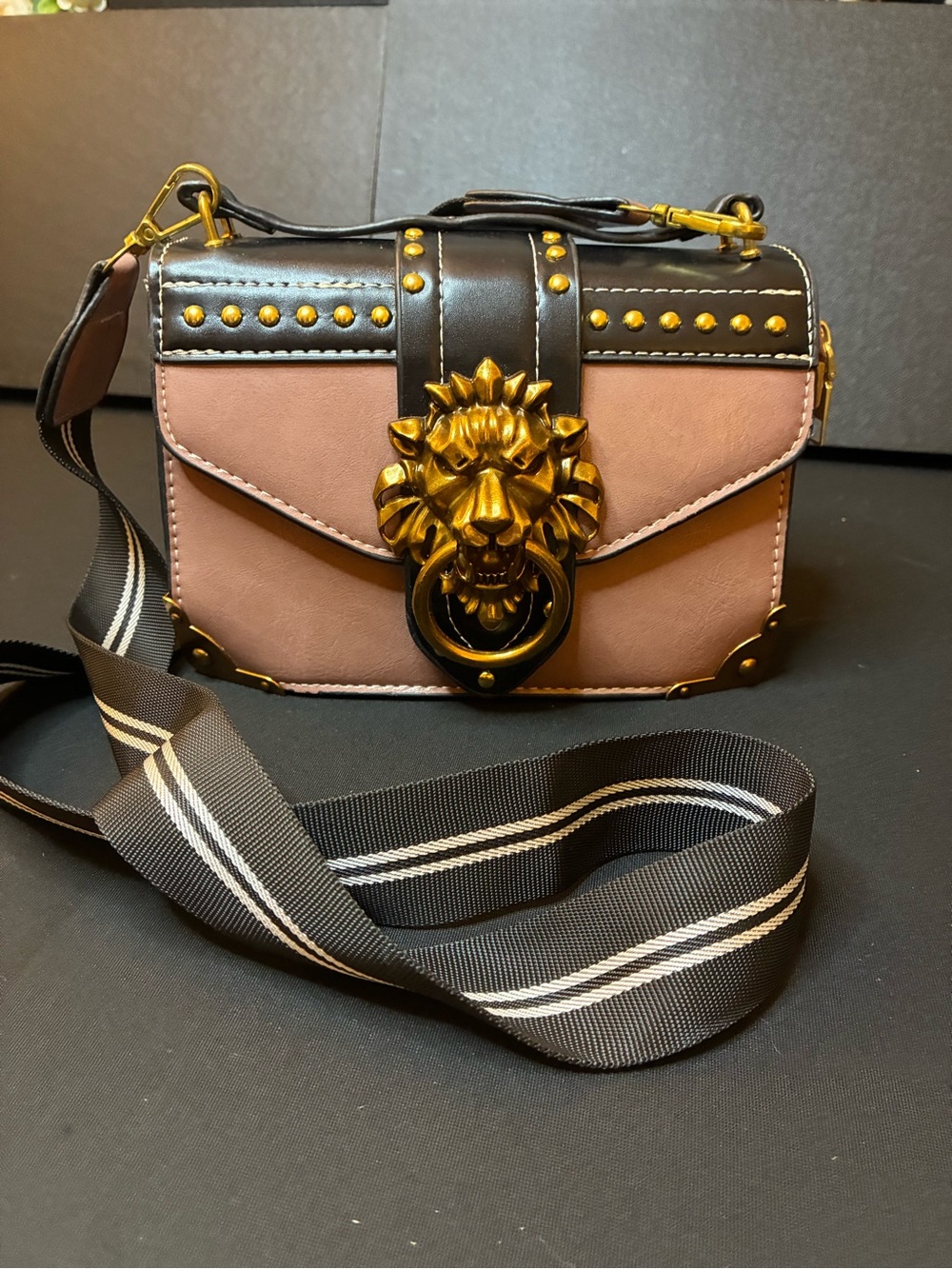 Pink Satchel with Gold Lion-Emblem and Contrast Trim